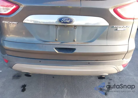 2015 Ford Escape Titanium z USA, uszkodzony, nr VIN 1FMCU9JX9FUA58932